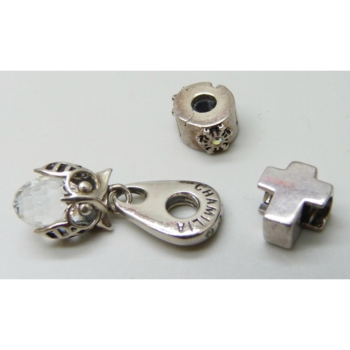 7039 - A silver Chamilia bracelet with ten silver Chamilia charms, and an unmarked charm, 42g total, boxed