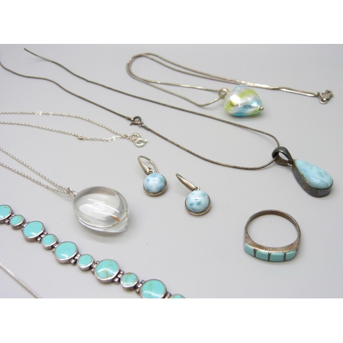 7043 - A collection of silver stone set jewellery, 49g, an unmarked ring and bracelet, two plated chains, a... 