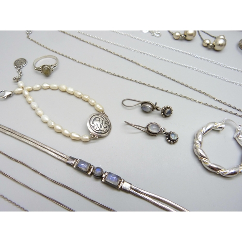 7045 - A collection of silver and white metal jewellery including moonstone set, 57g, together with a pair ... 