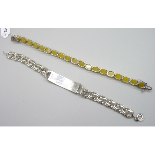 7051 - A silver ID bracelet, 21.5cm, a silver yellow quartz set tennis bracelet, 20cm, a large silver and r... 