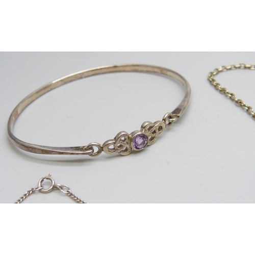 7063 - A collection of Rennie Mackintosh style silver jewellery - two bracelets, a bangle, two pendants on ... 