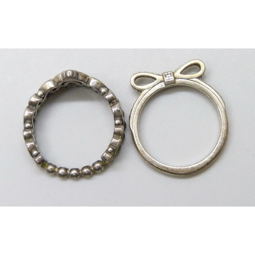 7067 - Two silver Pandora rings, both size L, and a pair of silver Pandora earrings