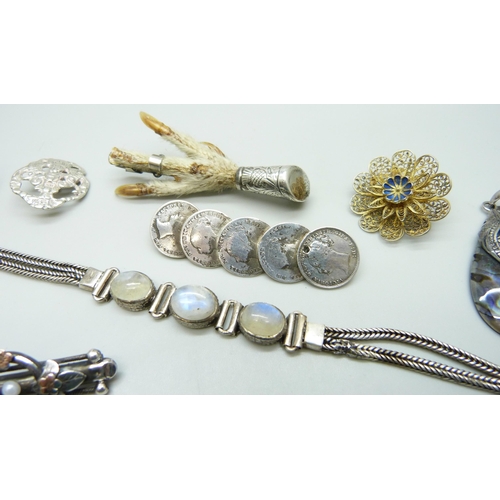 7070 - A silver set moonstone bracelet, two silver buttons, a Victorian silver bar brooch, a silver gilt ri... 