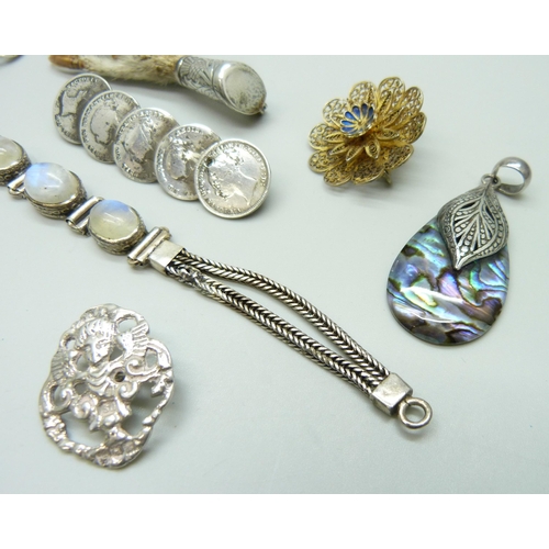 7070 - A silver set moonstone bracelet, two silver buttons, a Victorian silver bar brooch, a silver gilt ri... 