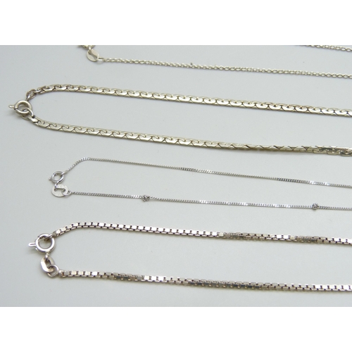 7075 - A collection of silver pendants and chains including a Malcolm Gray bird pendant, 39g, together with... 