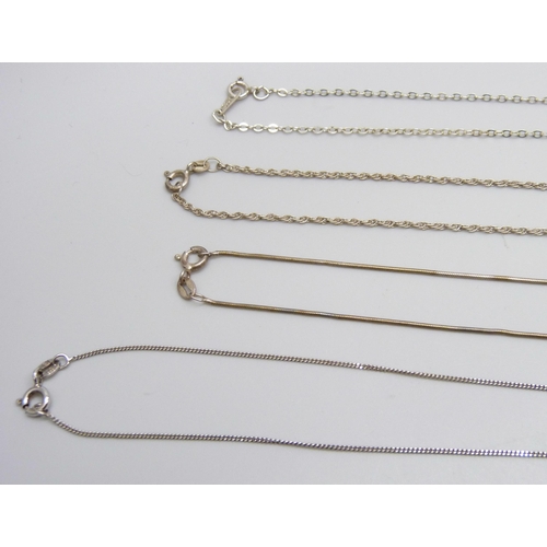 7075 - A collection of silver pendants and chains including a Malcolm Gray bird pendant, 39g, together with... 