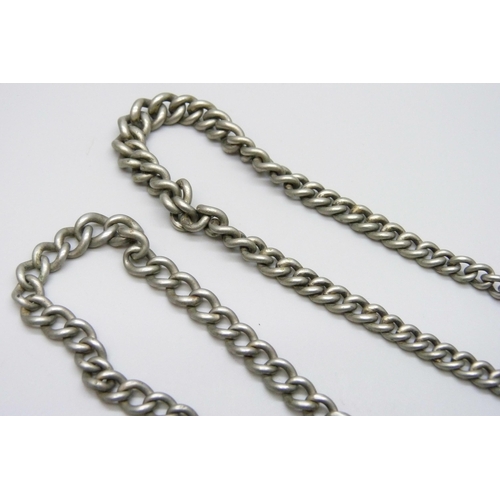 7084 - Two unmarked Albert chains, one with a silver fob