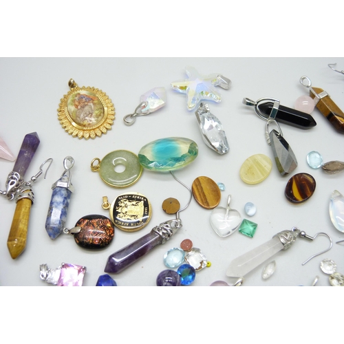 7089 - A collection of gemstone pendants and loose gemstones