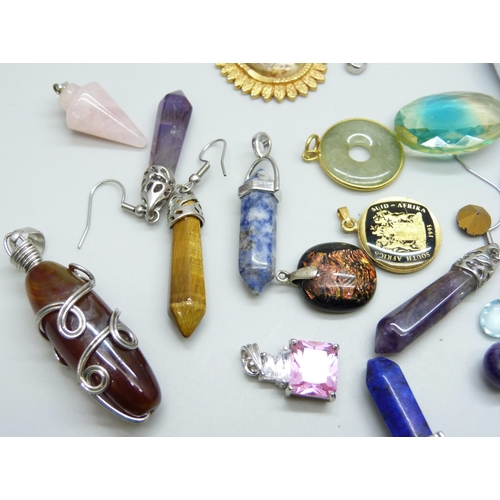 7089 - A collection of gemstone pendants and loose gemstones