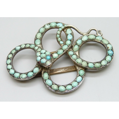 7095 - A turquoise set buckle in the form of a snake, 6.5cm, together with a turquoise set adornment