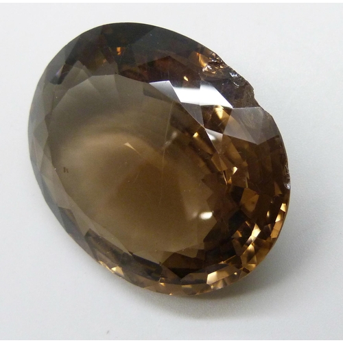 7096 - Two large citrine / smoky quartz stones, total weight 229 carats, both with chips