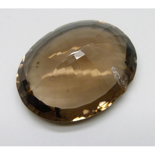 7096 - Two large citrine / smoky quartz stones, total weight 229 carats, both with chips