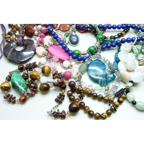 7118 - A collection of gemstone jewellery including silver mounted