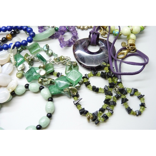 7118 - A collection of gemstone jewellery including silver mounted