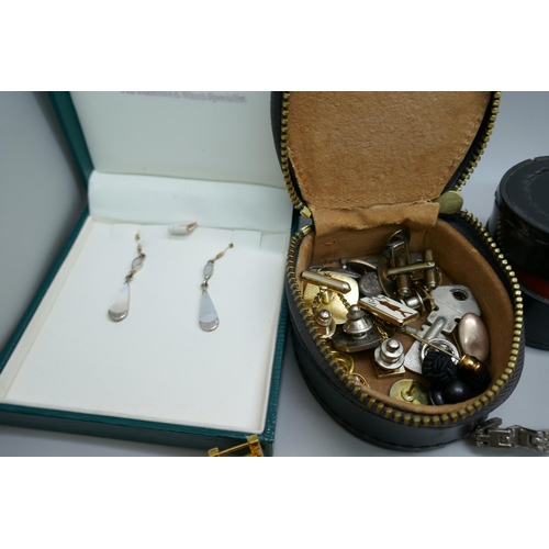 7120 - A collection of costume jewellery including a pair of silver earrings