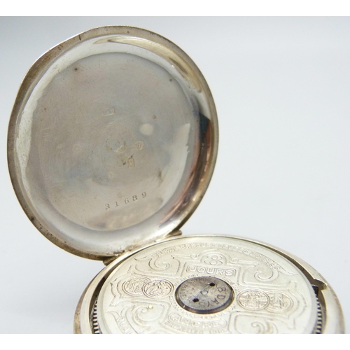 7136 - A silver Hebdomas 8 day pocket watch, import mark London 1918