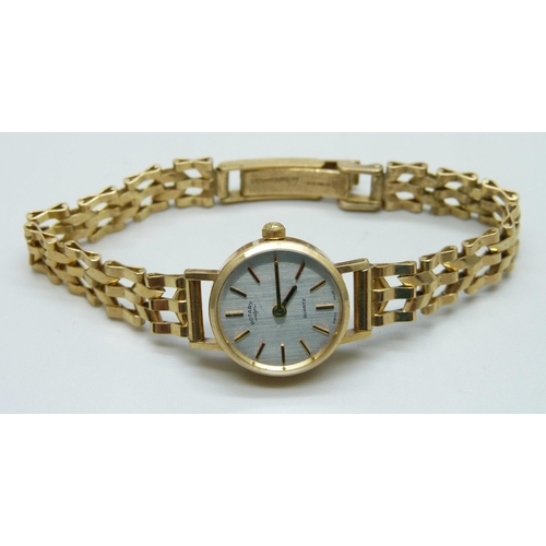 7145 - A 9ct gold cased lady's Rotary wristwatch on a 9ct gold strap, 15.8g total weight including movement... 