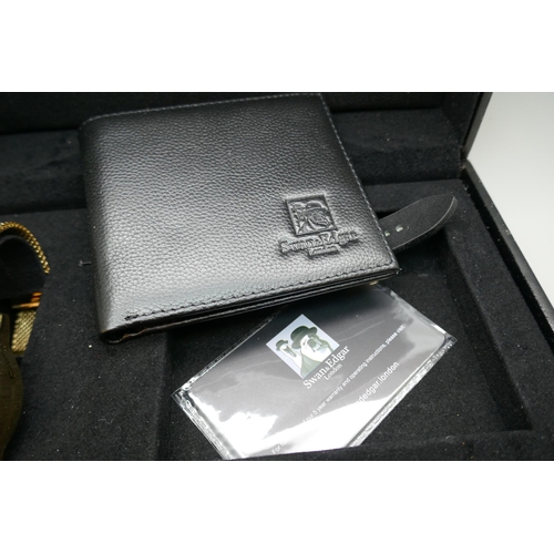 7152 - A Swan & Edgar watch, strap and leather wallet set, cased