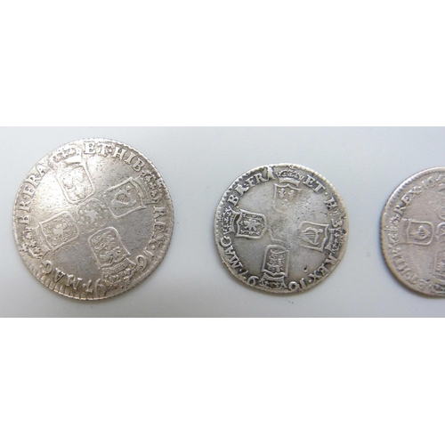 7169 - Coins; four William III silver coins, three shillings, 1696, 1697 and one other, possibly 1696, and ... 