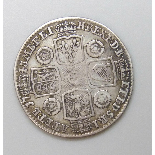 7175 - Coins; a George II 1743 shilling