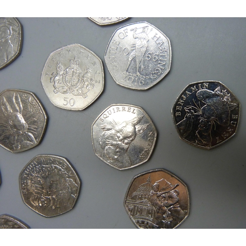 7198 - A collection of collectable 50p coins including Beatrix Potter, Paddington, NHS, Olympic, etc.