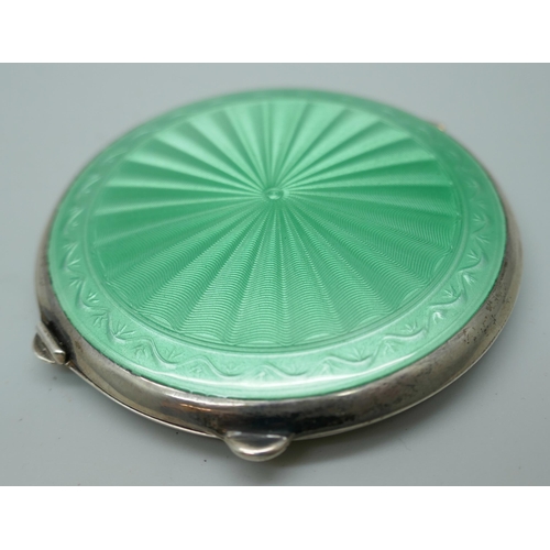 7229 - An Art Deco silver and green guilloche enamel compact, Joseph Gloster, Birmingham 1922, 71g, 6.5cm