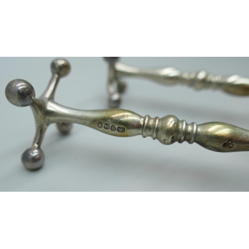 7230 - A pair of Victorian silver knife rests, London 1858, 88g