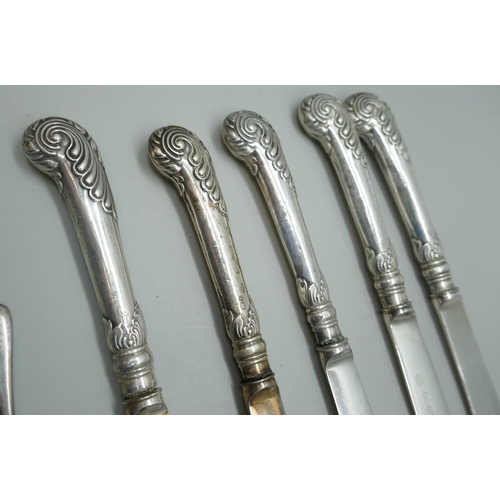 7235 - A collection of silver spoons, 81g, and a set of silver handled knives