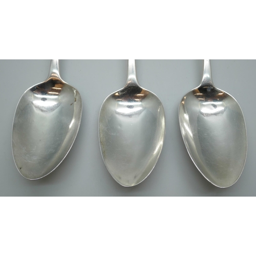 7239 - A set of three George III silver serving spoons with monograms to handles, JB, London 1814, 152g