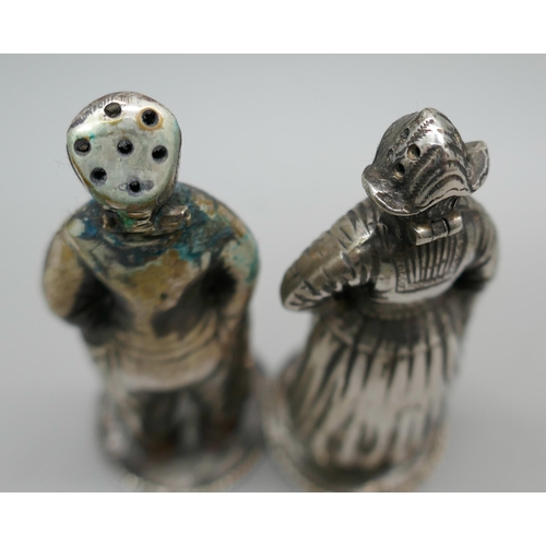 7248 - A Dutch novelty figural salt and pepper set, embossed Volendam to base, 72g