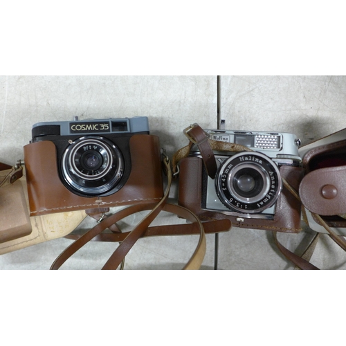 5106 - A large quantity of assorted cameras and other photograph equipment including a Fujifilm Finepix S57... 