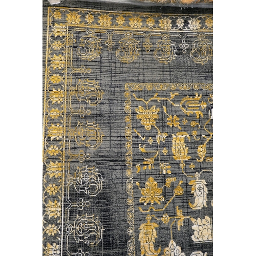 3149 - A deep grey and gold ground vintage style rug, (300 x 200cm)