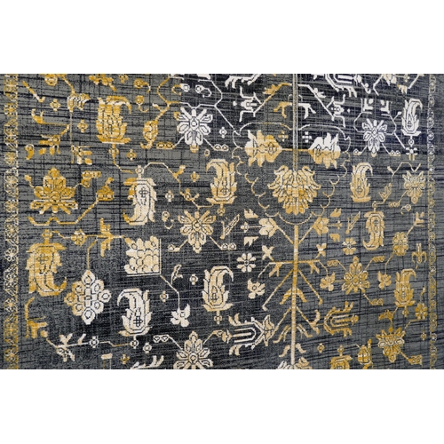 3149 - A deep grey and gold ground vintage style rug, (300 x 200cm)