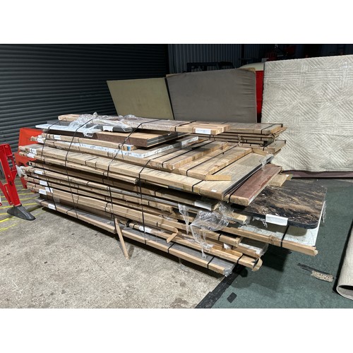 4135 - A pallet of worktops and tek boards - various sizes and styles - 28 in total  * This lot is subject ... 