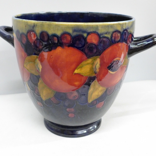 2016 - A large Moorcroft open pomegranate two handled planter, height 21cm, diameter 21cm