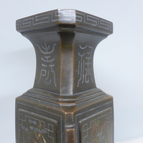 2019 - A Chinese bronze rhombus shaped vase with enamelled detail, 28cm