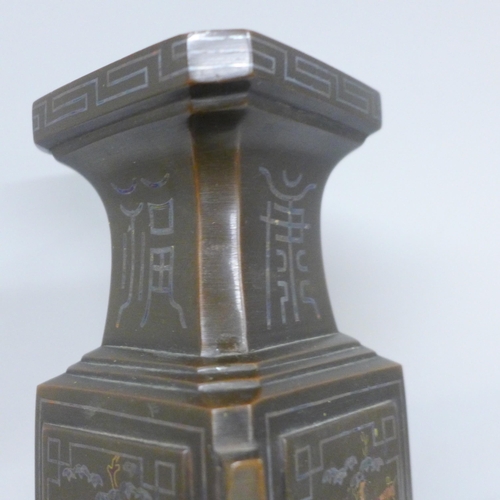 2019 - A Chinese bronze rhombus shaped vase with enamelled detail, 28cm