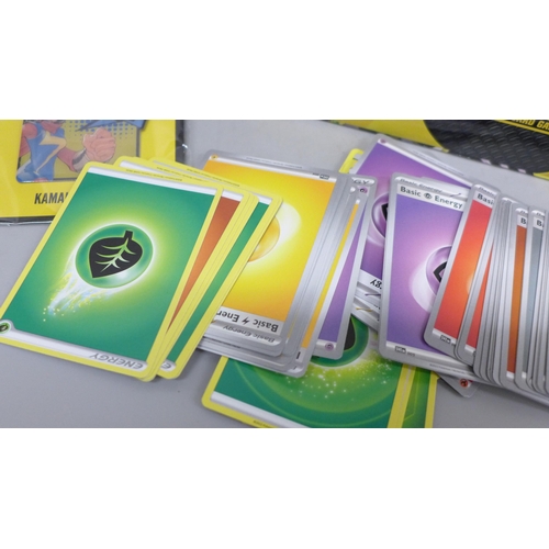 2032 - A large collection of Pokémon cards with eight Marvel badges and two other badges