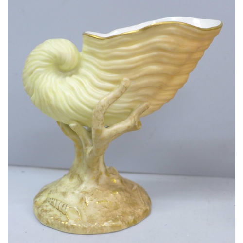 2033 - A Royal Worcester blush ivory vase with robin on a gilt branch detail together with a similar one de... 