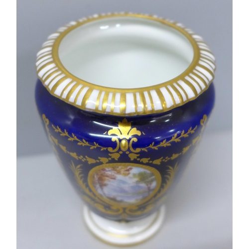 2033A - A Royal Crown Derby hand painted miniature vase, signed W.E.J. Dean, 9cm