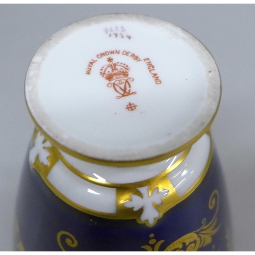 2033A - A Royal Crown Derby hand painted miniature vase, signed W.E.J. Dean, 9cm