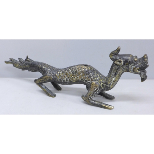 2037 - A Chinese bronze dragon, 21cm