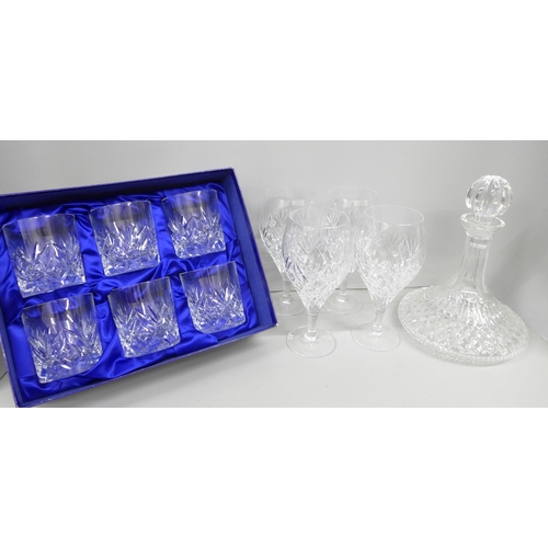 2061 - A Waterford crystal glass ship's decanter, boxed, four Royal Doulton finest crystal stemmed glasses ... 