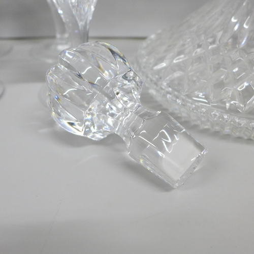 2061 - A Waterford crystal glass ship's decanter, boxed, four Royal Doulton finest crystal stemmed glasses ... 