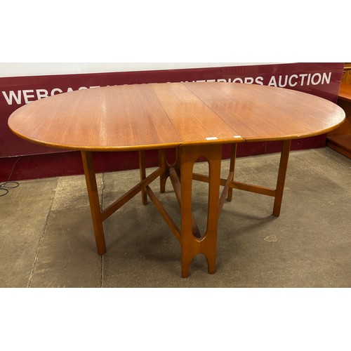 33 - A Jentique teak drop leaf table