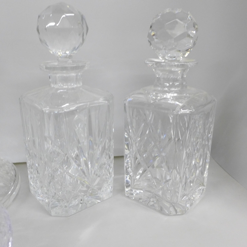 2085 - A collection of six glass decanters including a ships decanter