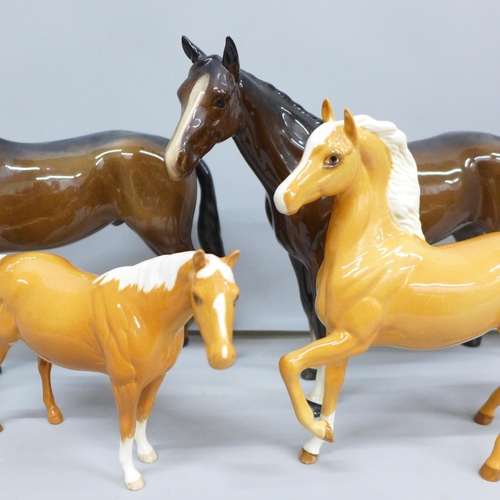 2104 - Four Beswick horses; two Palomino and two others