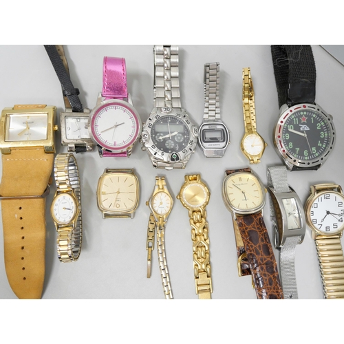 2110 - A large collection of lady's and gentleman's wristwatches