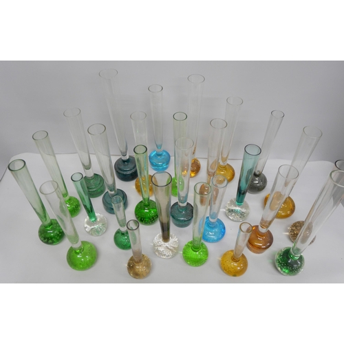 2112 - A collection of twenty-seven glass glass bud vases