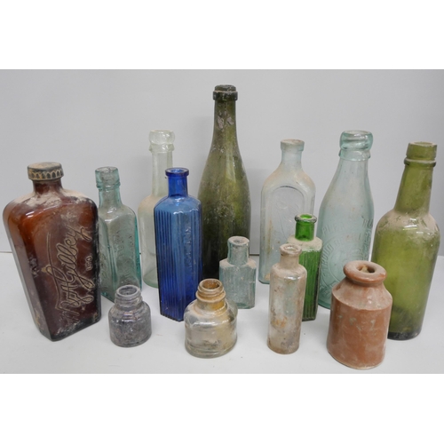 2113 - A box of old bottles, stoneware and glass, some advertising included, (25+)